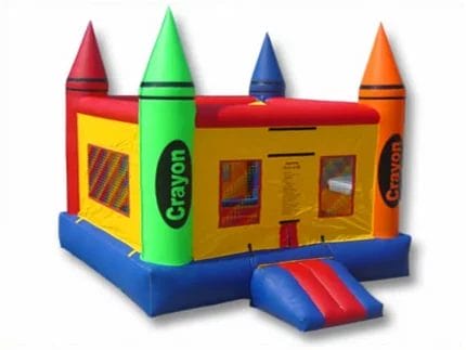 Colorful crayon-themed bouncy castle with red, green, blue, and orange turrets, mesh sides, and entry ramp. Perfect for kids' parties. Buy in Canada online.